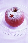 Christmas apple with icing sugar decoration