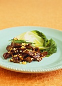 Beef with ginger, peanuts and pak choi