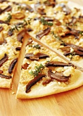 Pizza with mushrooms, gorgonzola and thyme