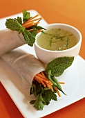 Rice paper rolls with vegetable and herb filling