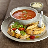 Tomato soup with basil oil and bruschetta