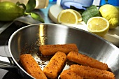 Fish fingers in a frying pan
