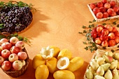 Assorted fruit grouped round edge of picture