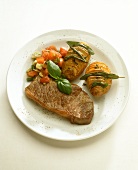 Rump steak with herb potatoes and tomato salsa