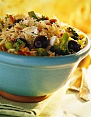 Rice noodle salad with broccoli and black olives