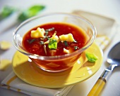 Tomato soup with cheese and basil