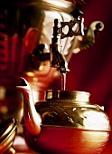 Water running out of samovar into a pot
