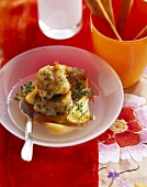 Clear meat broth with gorgonzola dumplings and pears