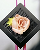 Flower made from slices of preserved ginger 