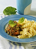 Lentils with spinach, tomatoes and pasta spirals