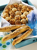 Bread roll sun and bread sticks with salt and caraway