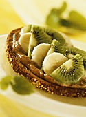 Wholemeal bread with soya and hazelnut spread and fresh fruit