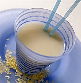 Rice milk in glass with straws