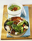Tomato & spinach salad with goat's cheese, cold cucumber soup