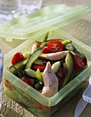 Tomato and cucumber salad with chicken breast
