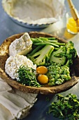 Steamed spring vegetables with egg and feta cheese