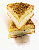 Two pieces of ‘bee-sting’ cake with crumble