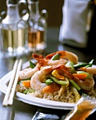 Asian pan-cooked shrimp and vegetable dish on rice
