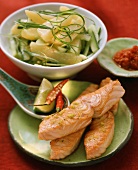 Salmon fillet and potato and cucumber salad