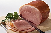 Prague ham, whole and sliced