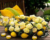 'Hollywood' rose, lemons, olive branches and pistachio leaves