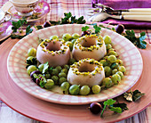 Sugar rings with chopped pistachios and gooseberries