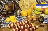 Raw meat kebabs, corn cakes and mate (Paraguay)