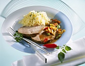 Spicy roast pork with potato snow and roasted vegetables