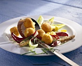 Salad with guinea-fowl and deep-fried Camembert balls