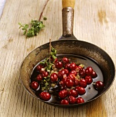 Cranberries in a frying pan for cranberry chutney