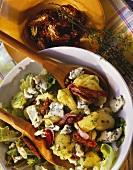 Potato and endive salad with dried tomatoes