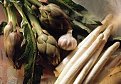 Artichokes with stalks, white asparagus and garlic bulb