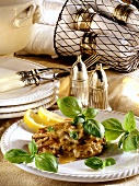 Marinated veal escalope under mushroom topping