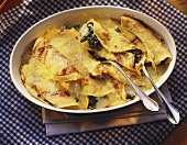 Pancakes with spinach & mozzarella filling & parmesan