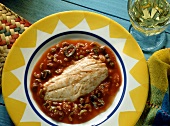 Red snapper with tomatoes, olives and peppers