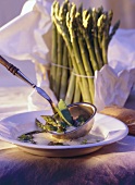 Green asparagus cream soup with mangetouts, chervil & mint