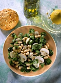 White bean and mushroom salad with corn salad leaves