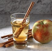 Cider drink with cinnamon sticks