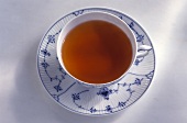 A cup of tea on light background