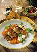 Veal roll kebab with onions & bay leaf on carrot crisps