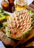 Hedgehog made from raw mince with onion pieces