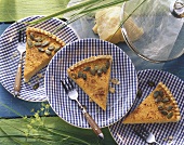 Pumpkin quiche with pumpkin seeds (three individual pieces)