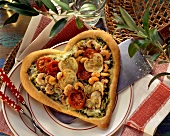 Pizza heart with shrimps, courgettes & cherry tomatoes