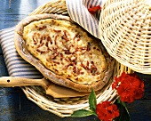 Tartes flambées with bacon & onions in basket