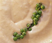 Sauce Choron with green peppercorns (close-up)