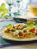 Ravioli with bean and tomato filling and broad beans