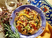 Turkish rice noodles with tomatoes, peppers & oregano flowers