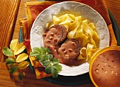 Venison fillet with nut crust, rosehip sauce & ribbon noodles