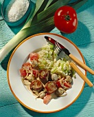 Lamb medallions with tomatoes, mushrooms & rice with leeks