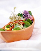 Lettuce with lemon & almond sauce, sprouts & flowers